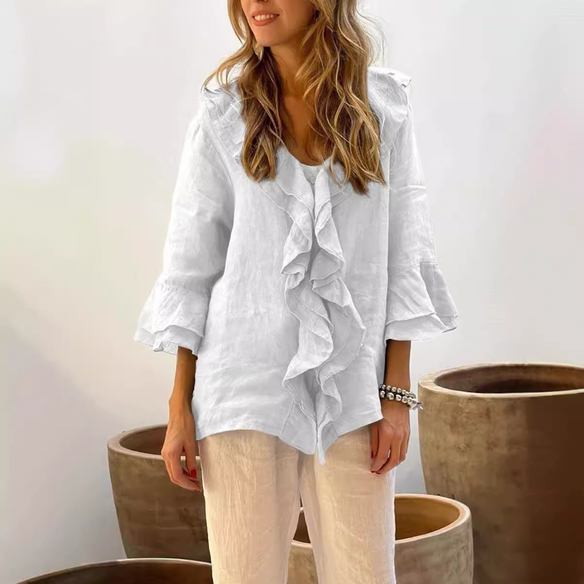 2024 estilo europeo y americano transfronterizo otoño color sólido nueva moda con cuello en V mangas voladoras con volantes suelta casual top mujer