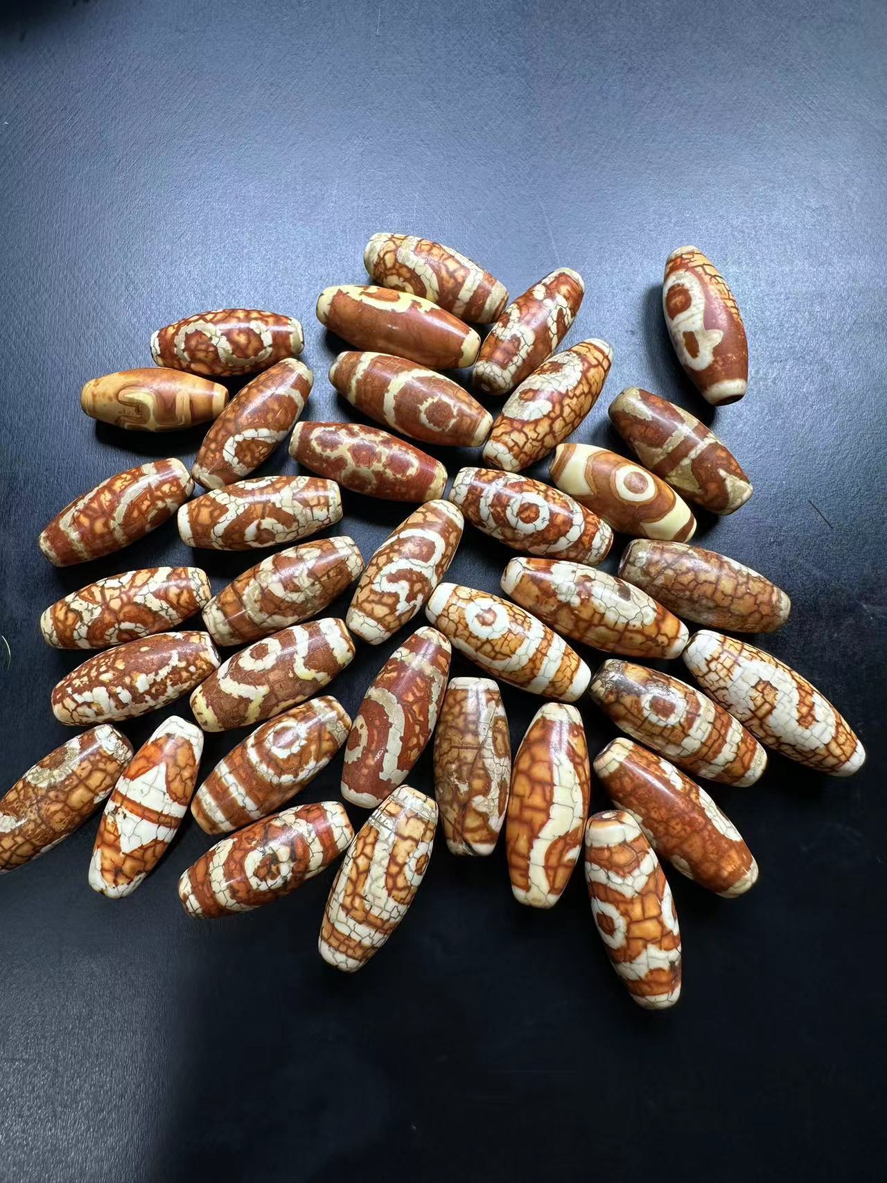 天然瑪瑙の卸売りチベット式の多トーテムは旧天珠風華老珠菩提仏珠を 