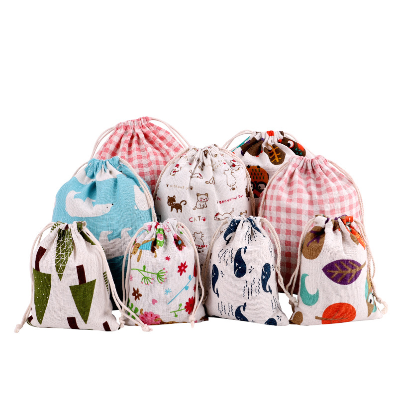 Fábrica en stock patrón creativo impreso algodón de mano cordón bolsa cordón regalo impresión cordón bolsa de almacenamiento al por mayor