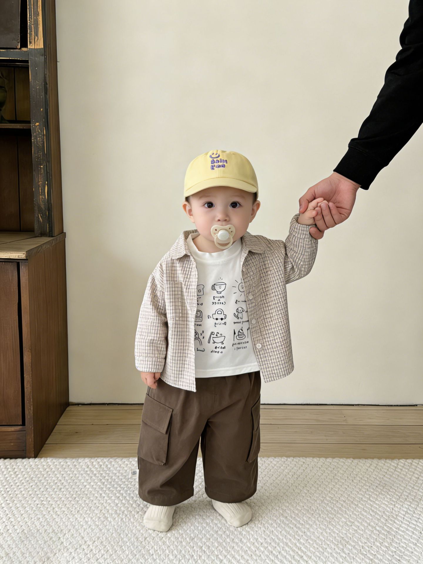 Primavera para niños coreanos de moda a cuadros de manga larga camisa de algodón 2026 nueva ropa de bebé extranjera blusa universal