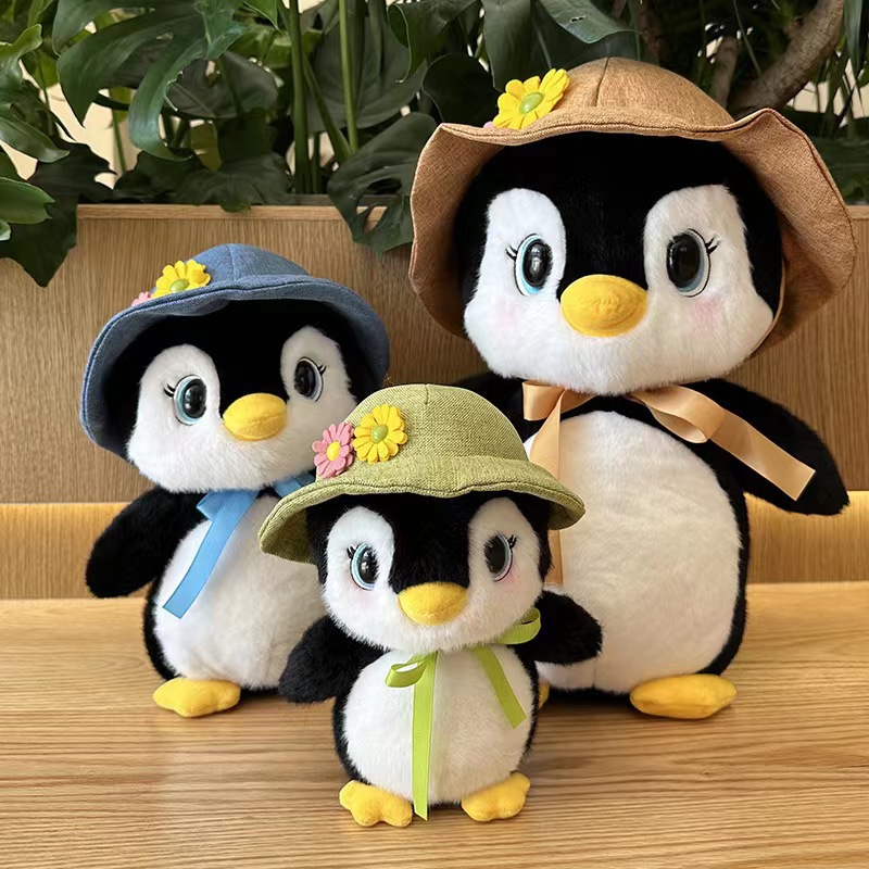 Bonito sombrero pingüino juguete de peluche 11CM animales pequeños pingüinos niños regalo de cumpleaños muñeca agarra