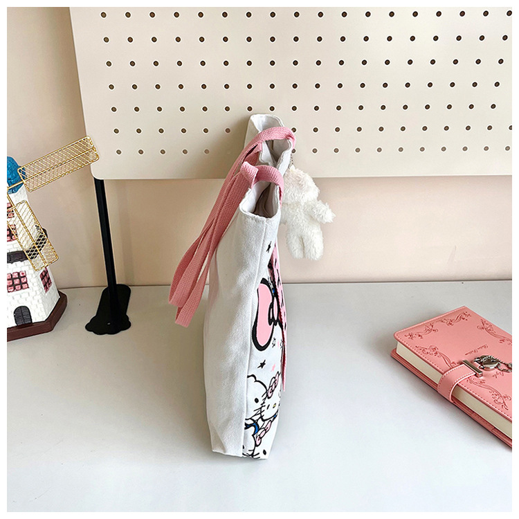 The new fashionable cartoon canvas bag, simple and versatile tote bag, cute commuting single-shoulder tote large bag, is selling well across borders undefined