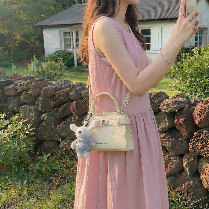 2026 nueva sensación diaria de bolsos portátiles de Kelly, mujeres de moda simple, versátil, lujoso, ligero, de viaje, una sola bolsa de hombro, moda