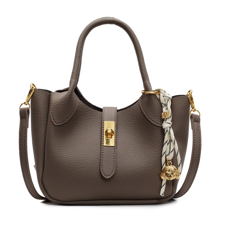 Bolso de cesta de verduras simple de comercio exterior para mujer 2025 nuevo bolso de hombro casual salvaje de moda bolso de cubo de aire extranjero