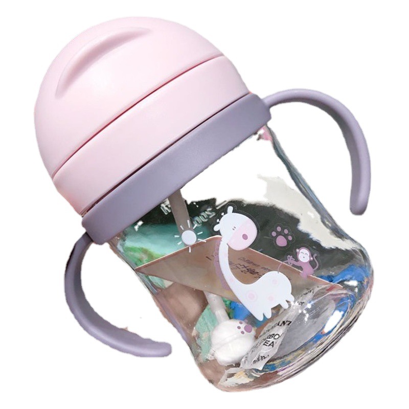 Nuevo bebé mango de dibujos animados taza de agua Flip bebé taza de paja con taza de succión de bola de gravedad 250ml
