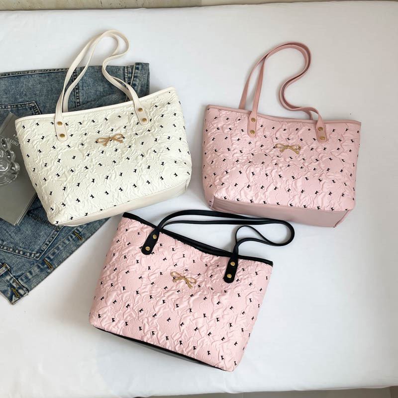2025 nuevo temperamento fresco bolso de viaje de gran capacidad ligero lujoso sensación casual bolso de hombro brazaleta bolso de mujer