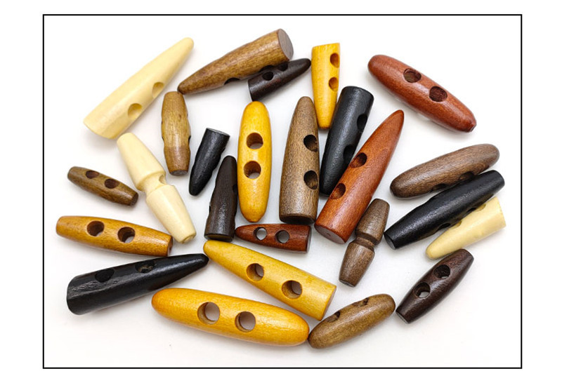 双孔木头橄榄扣 仿牛角纽扣 装饰木质纽扣 (19).jpg