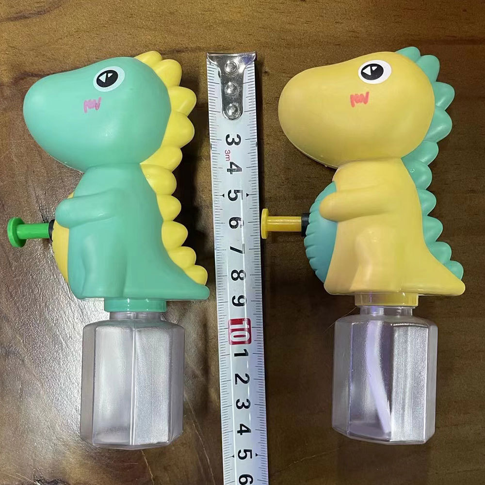 Playa de verano para niños al aire libre Presión de dinosaurios pistola de agua juguete Dinosaur pistola de agua