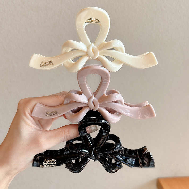 Temperamento arco flotante clip para el cabello de mujer cantidad de diseño de clip de tiburón tarjeta de cabello detrás de la cabeza agarrar clip para el cabello