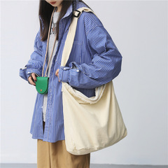 個性毛邊設計包包女新款簡約休閒大容量單肩包學生帆布斜挎包跨境