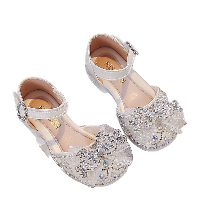 Sandálias infantiles 2026 verano nuevo diamante princesa zapatos de cristal bebés con suela suave sandálias de cabeza para niños grandes image 6