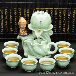 Modern lazy rotating kung fu tea set suit simple semi-automatic tea maker household Stone Mill teapot tea cup