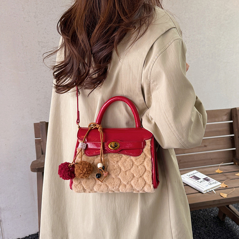 Otoño y invierno de alto nivel bolso de lana portátil para mujeres 2025 nuevo nicho Zhong commuting bolso de hombro bolso casual Kelly