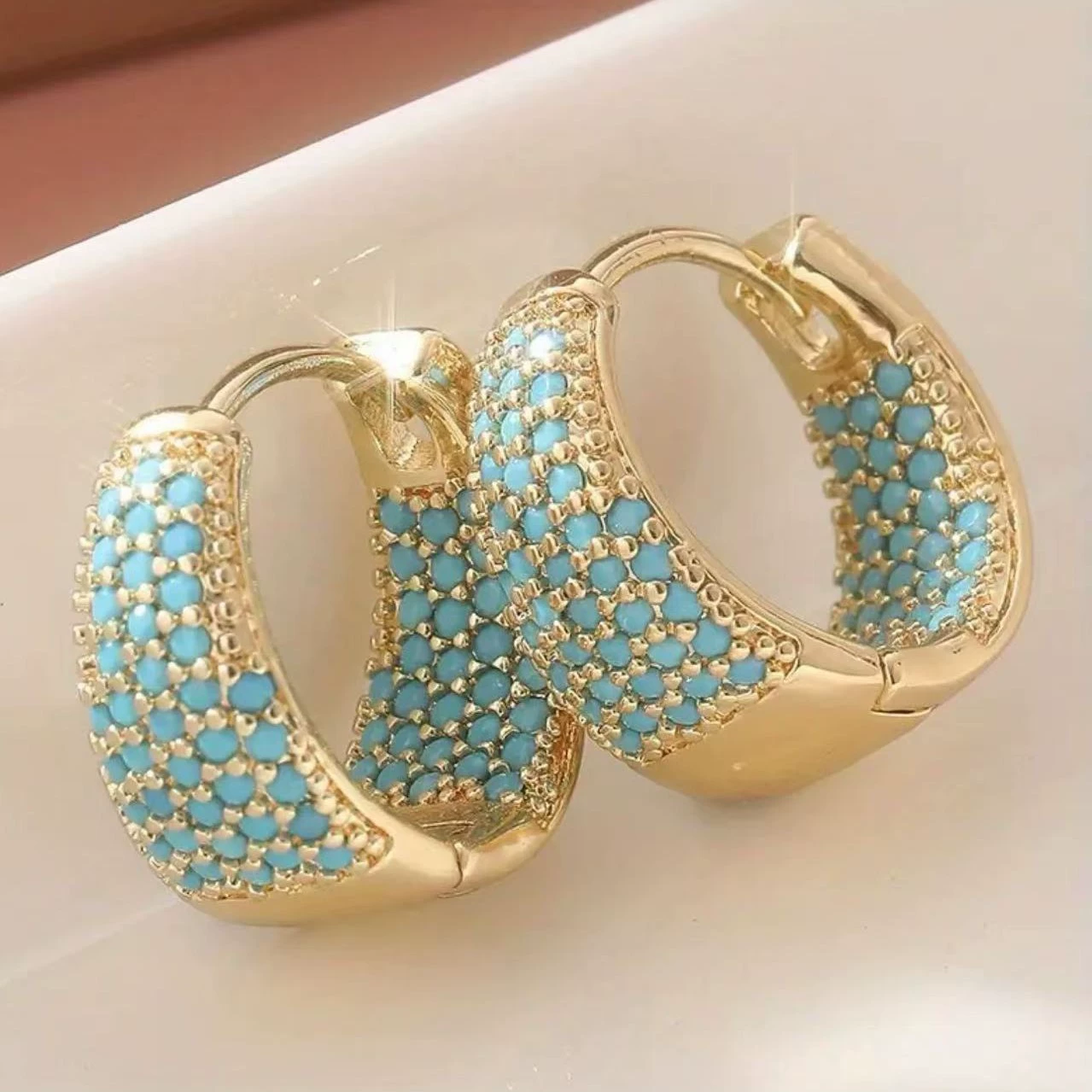 Серьги бирюзовые, медная циркония, изделие золото 750