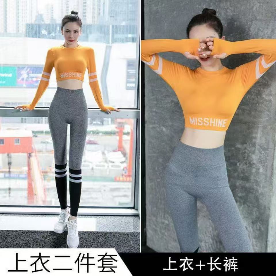 Yoga ropa de ejercicios femenina transfronteriza letras umbilicales camisa deportiva de mangas largas camisa apretada corta para correr rápido
