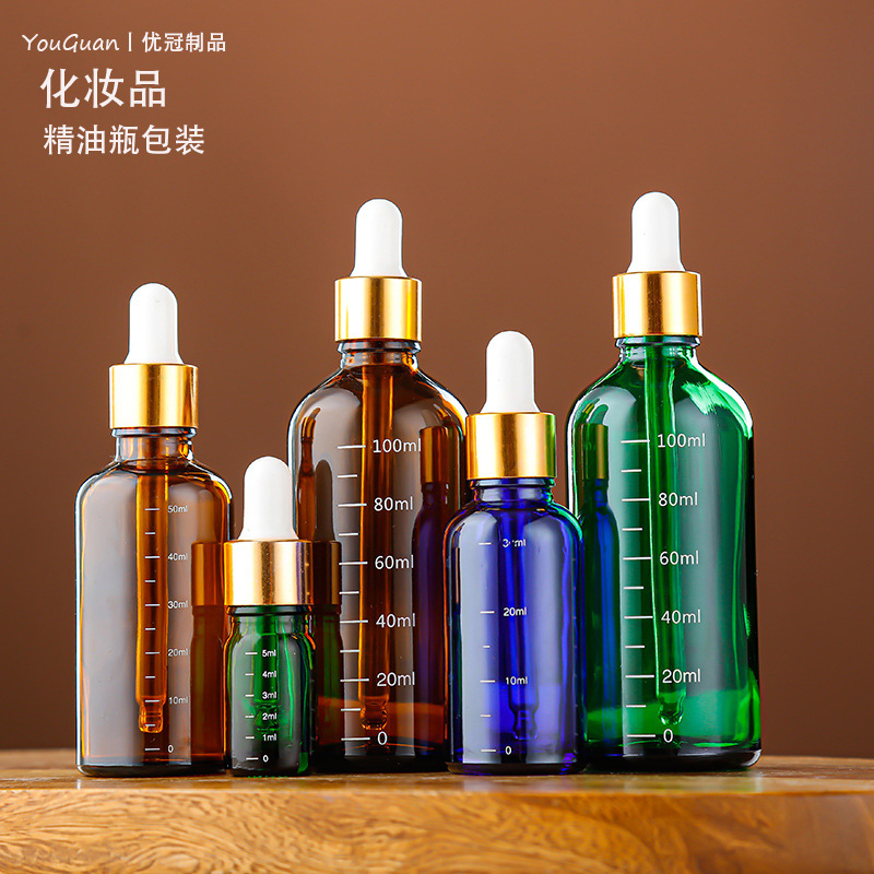 En stock Botella de aceite esencial marrón Botella cuentagotas de 10ml Botella vacía Botella cosmética de vidrio azul Botella secundaria de escala de 30ml