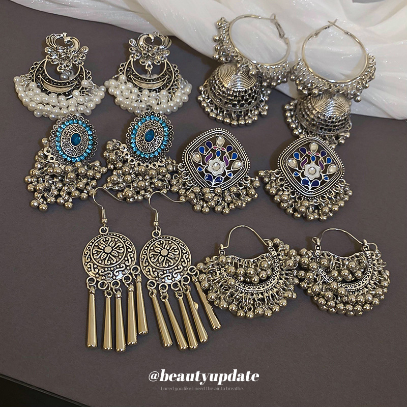 Pendientes geométricos de diamantes súper parpadeantes de estilo étnico Pendientes de lujo ligero de nicho retro Personalidad Accesorios de pendientes de alta gama