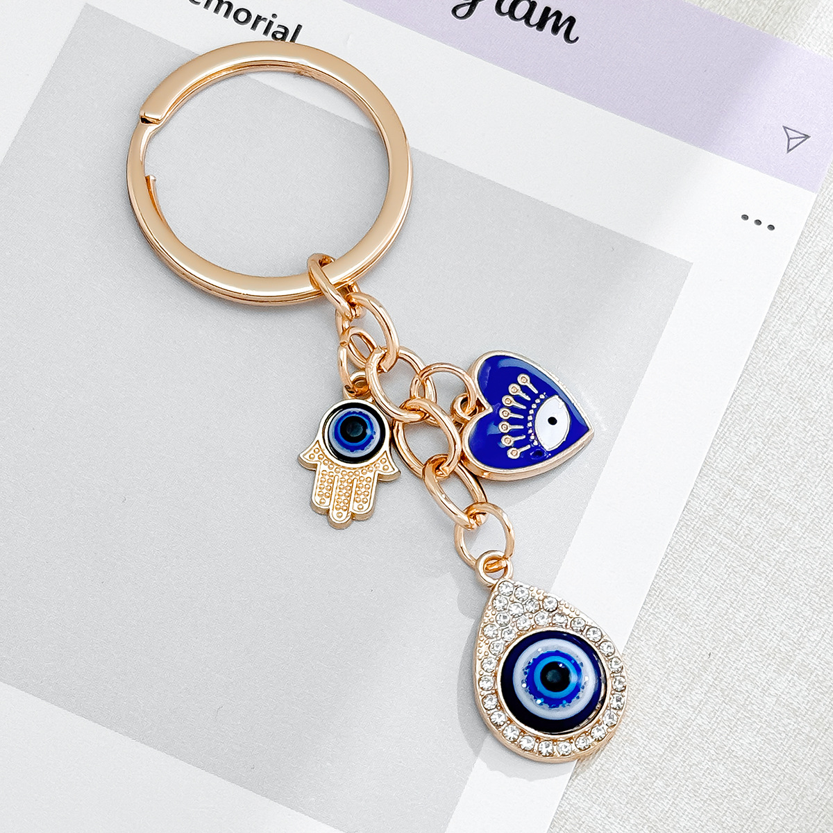 Cross-Border Hot Sale New Heart-Shaped Palm Water Drop Evil Eye Pendant Accessories Keychain Key Ring Manufacturer_voghion.com