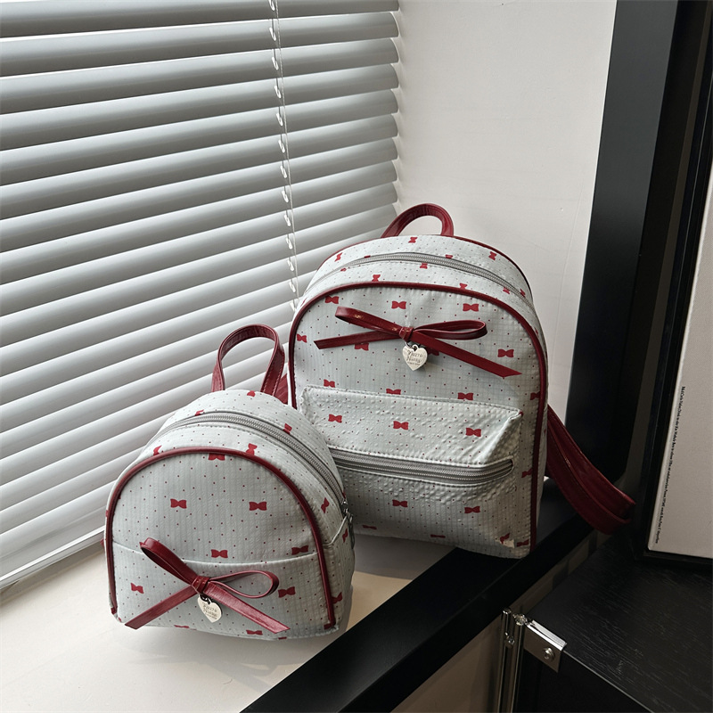 Bolsa de hombro de estilo académico coreano para mujeres 2026 nueva moda de verano mochila de arco pequeña bolsa de compras