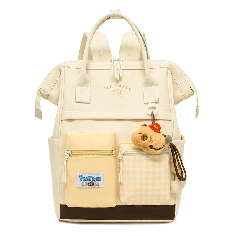 Bolsa de maternidad estilo japonés, de gran capacidad y alta estética, mochila para estudiantes, bolsa de maternidad portátil para exteriores, mochila de doble asa al por mayor.