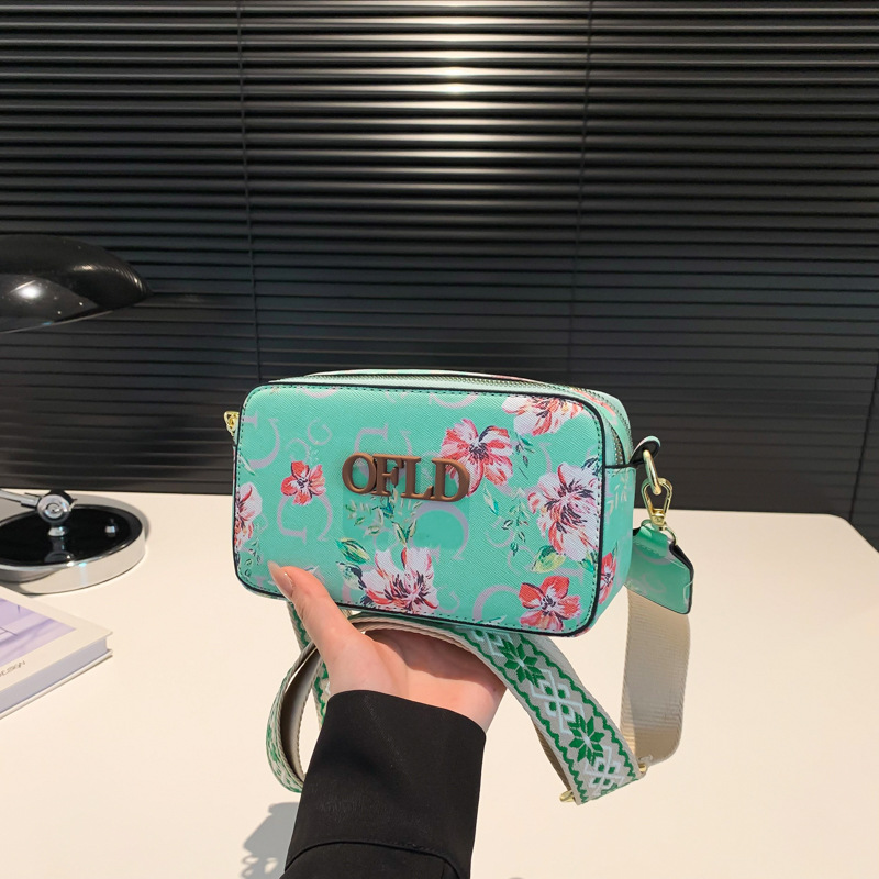 Comercio exterior transfronterizo nueva impresión de letras correas anchas moda todo-fósforo estilo caliente cámara bolso bandolera pequeño bolso cuadrado femenino