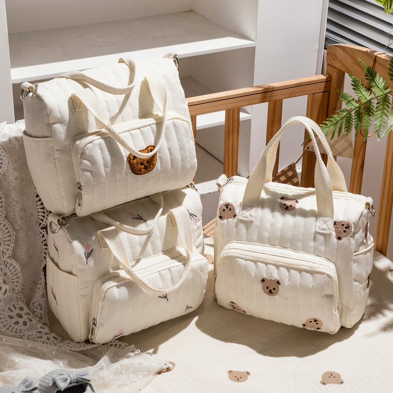 New Quilted Embroidered Mommy Bag, Lightweight for Short Trips, Bear-Themed Mother-Child Bag, Large Capacity, Hand-Held, Shoulder, and Crossbody Bag New Quilted Embroidered Mommy Bag, Lightweight for Short Trips, Bear-Themed Mother-Child Bag, Large Capacity, Hand-Held, Shoulder, and Crossbody Bag