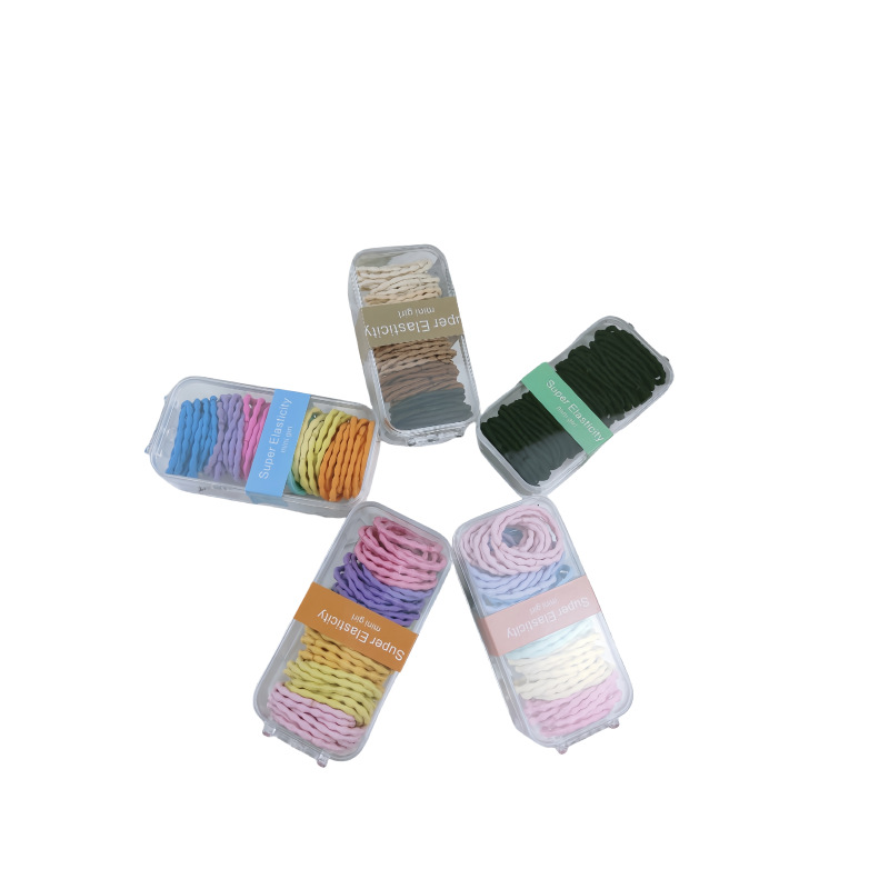 Caja de 60 colores básicos de frijoles básicos de frijoles anillo de cabello brillante de alta elasticidad versátil cuerda de cabello de cola de caballo duradera para niños