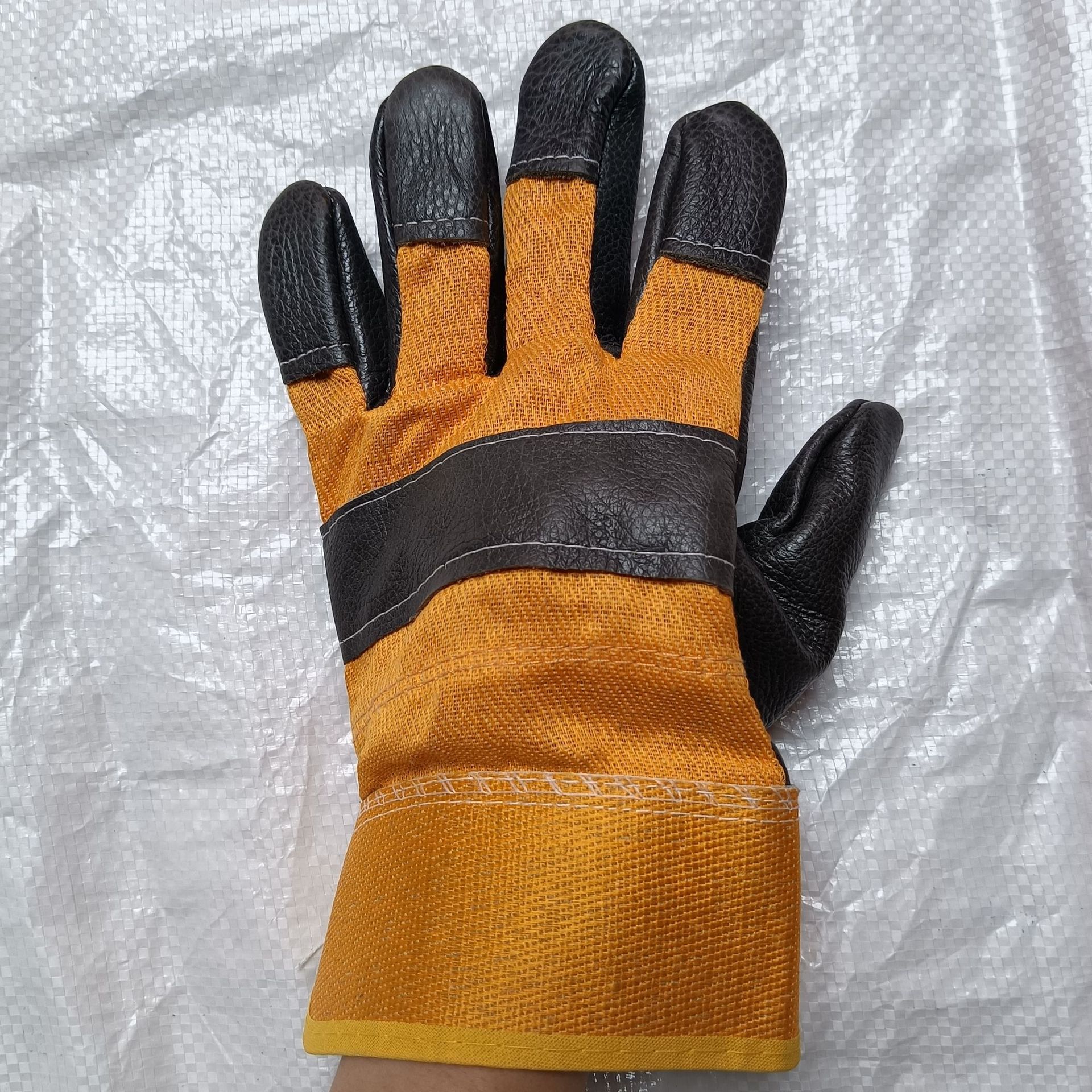 现货批发黄布头层牛皮分刀焊接手套加厚耐磨隔热防护劳保手套