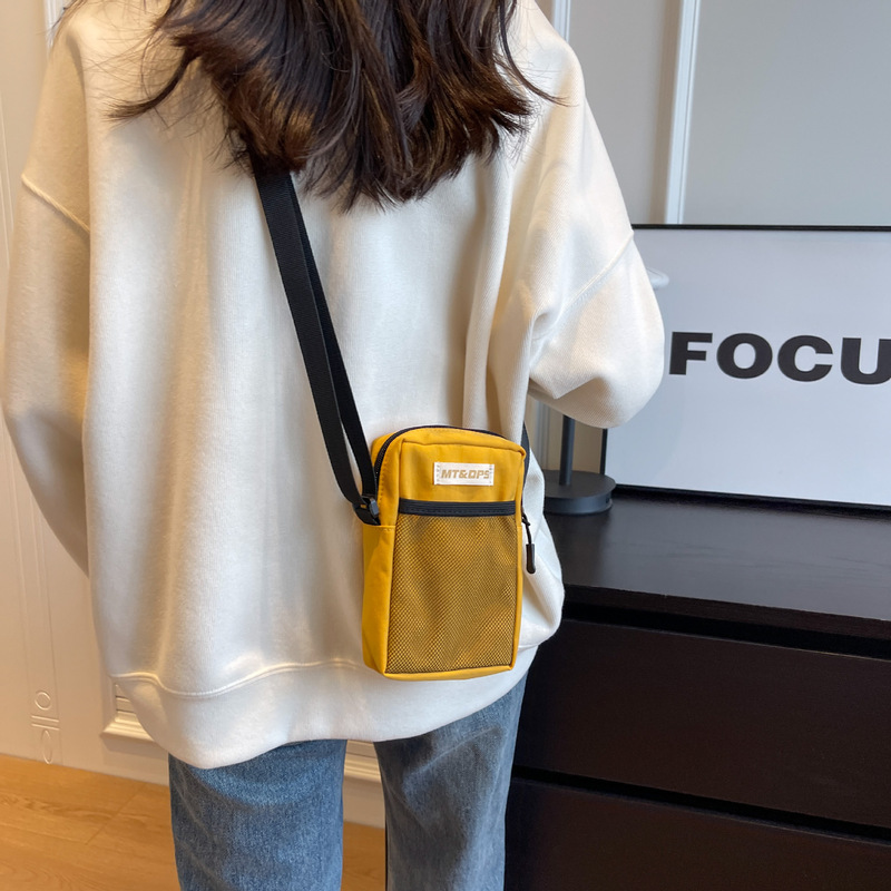 Solid color waterproof niche fashion brand mobile phone bag ins fashion mini coin purse earphone bag personalized small shoulder bag