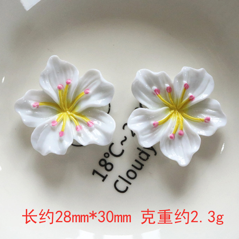 Nuevos accesorios de bricolaje de flor de durazno de resina rosa, zapatos con agujeros de pegamento de crema, fundas para teléfonos móviles, accesorios para el cabello, material de imán para refrigerador al por mayor