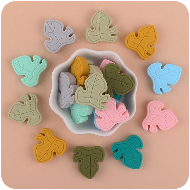 Bebé suministros de dibujos animados cuentas hoja de silicona DIY bebé mordedura chupete cadena mordedor pulsera accesorios de juguete