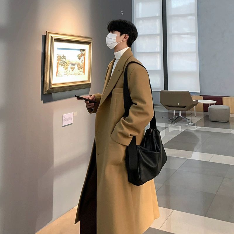 冬の新型の毛はコートの男性の中で長いタイプはひざを過ぎてカシミヤのラシャの風衣の男性のコートの韓国版がゆったりとしています。