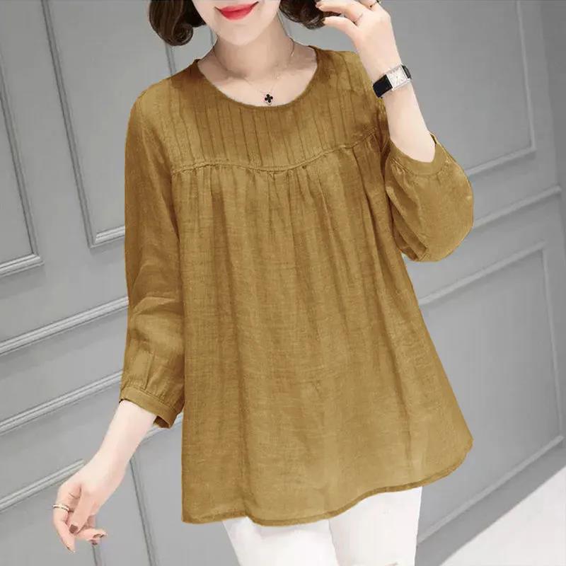 Solid Color Cotton and Linen Round Neck Nine-Quarter Sleeve Shirt for Women, New Autumn and Summer Style, Large Size Loose Fit, Slimming and Tummy-Covering Top Solid Color Cotton and Linen Round Neck Nine-Quarter Sleeve Shirt for Women, New Autumn and Summer Style, Large Size Loose Fit, Slimming and Tummy-Covering Top