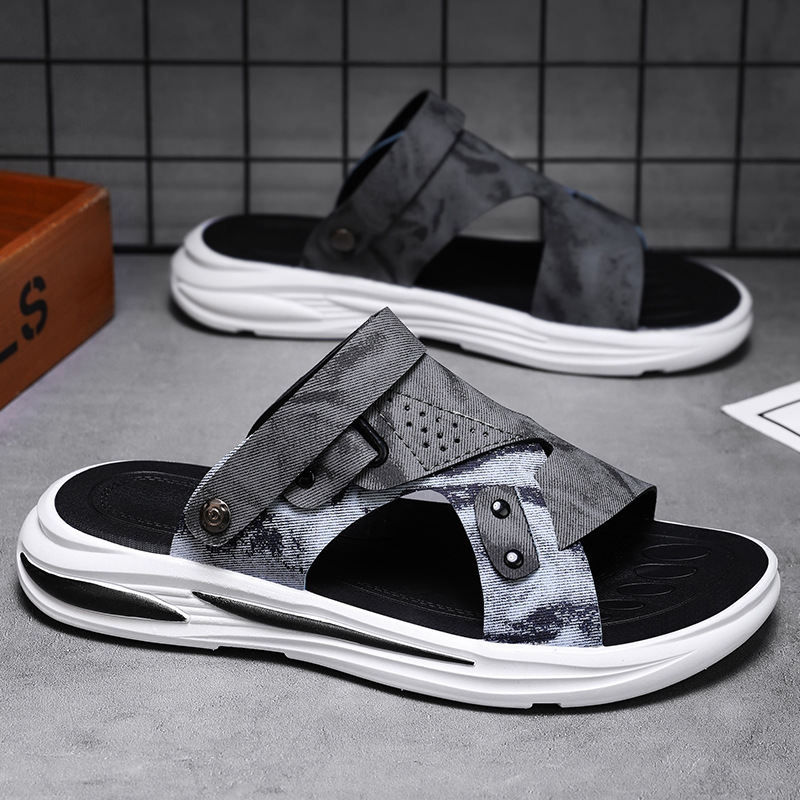 Verano nuevo cojín de aire de piel suave zapatillas de moda de negocios zapatos de playa casuales un pedazo al aire libre dos sandalias para hombres