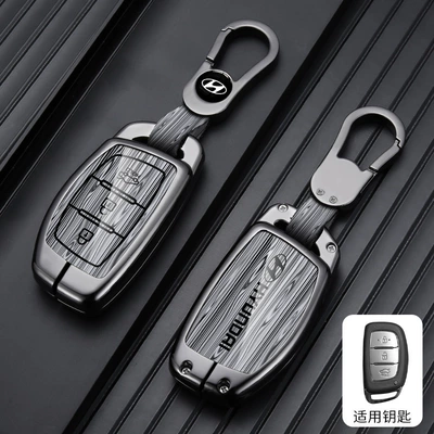 21/22 Fifth Generation Tucson L: Car key bag - standard-model-b-lower-trunk-wood-grain-gray-car-logo-buckle