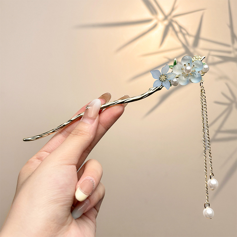 Nueva horquilla china 2025 nuevo estilo estilo antiguo horquilla mujer falda de cara de caballo de alta calidad estilo nacional horquilla de madera paso a paso horquilla tocado