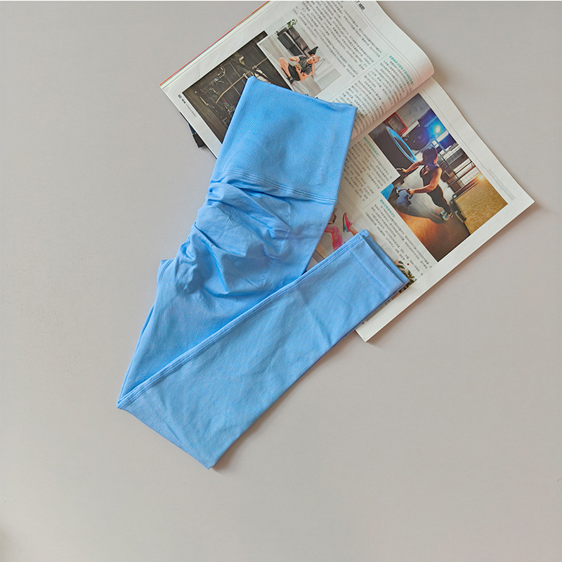 Pantalones de gimnasio sin costura europeos y estadounidenses, cintura alta, abdomen, caderas, pantalones de melocotón para correr, yoga, leggings apretadas