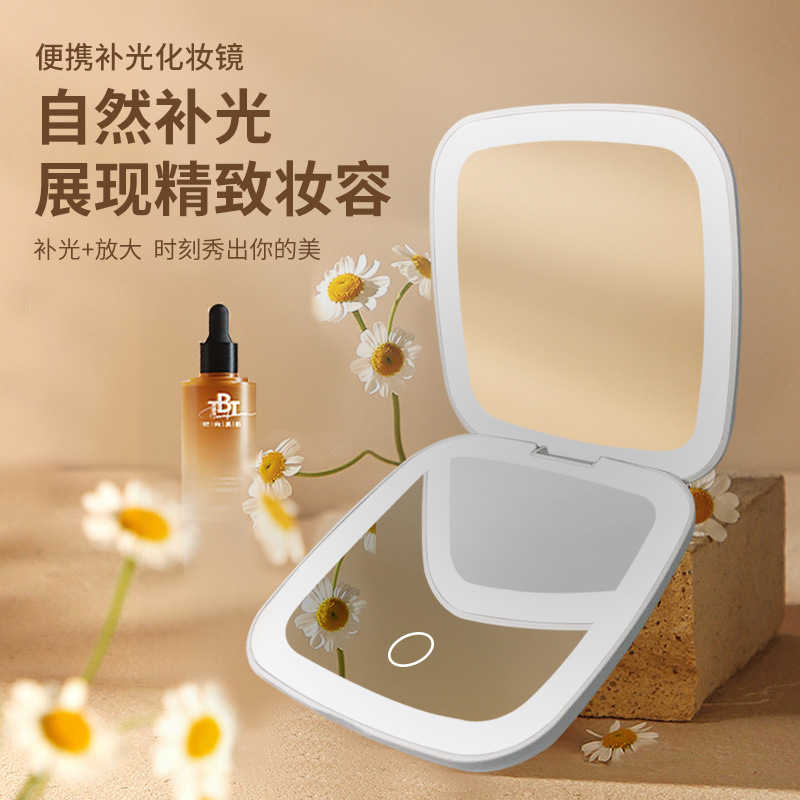 Diseño de fábrica regalo pequeño espejo Amazon LED espejo de maquillaje con luz Flip portátil de mano pequeño espejo logo