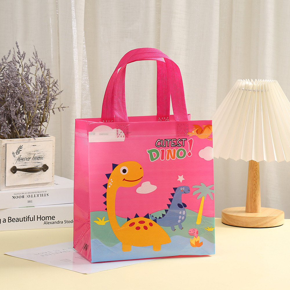 Bolsa de regalo pequeña para el Día del Niño, bolsa de regalo de tela no tejida con diseño de dinosaurio, bolsa de regalo para dulces de jardín de infantes image 3