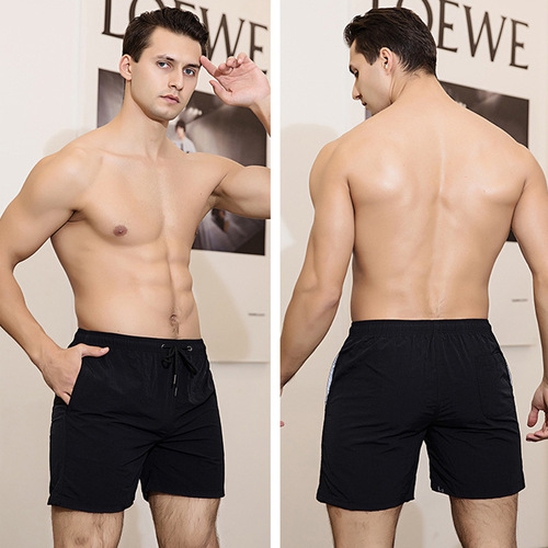 Men's European and American Beach Shorts 2024 Spring and Summer Quick-Drying Loose Beach Vacation Shorts Four-Way Pants Solid Color Sports Pants