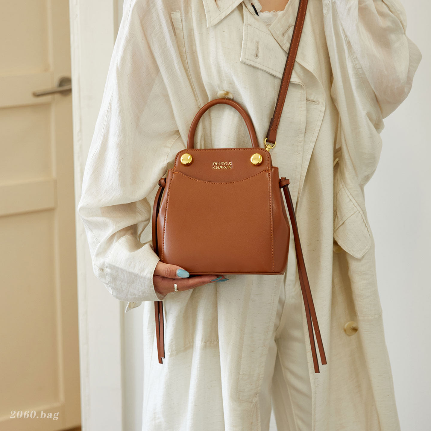 Bolso de moda popular 2026 simple mochila de verano nueva mujer simple este año sensación universal cubo hombro