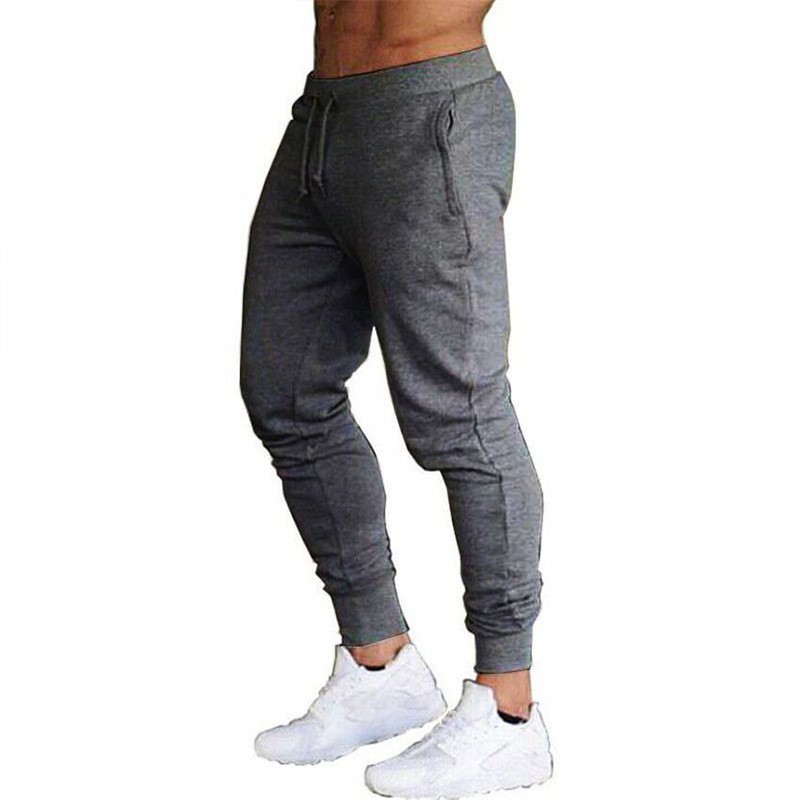 Pantalones deportivos pantalones de correr para hombres pantalones de entrenamiento de fútbol de fitness Pantalones deportivos casuales delgados europeos y americanos pantalones de hombres flacos para hombres
