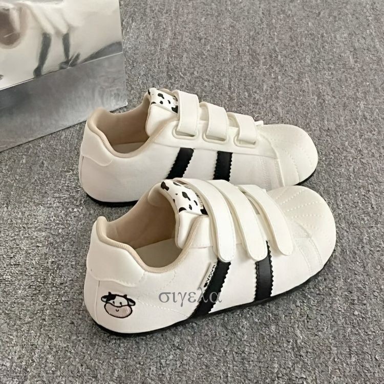 Vaca bordada de mango variante zapatos blancos 2025 otoño nuevos zapatos deportivos de suela delgada velcro zapatos de entrenamiento de mujeres
