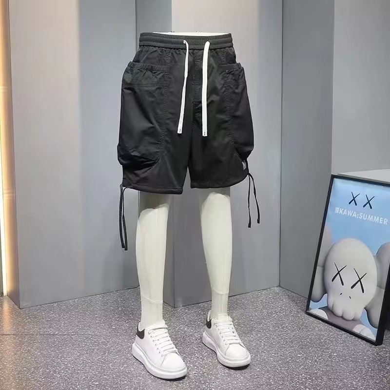 Moda 2024 nuevo estilo herramientas recto casual hombres sueltos de verano pantalones de moda sueltos control de imagen de fondo blanco