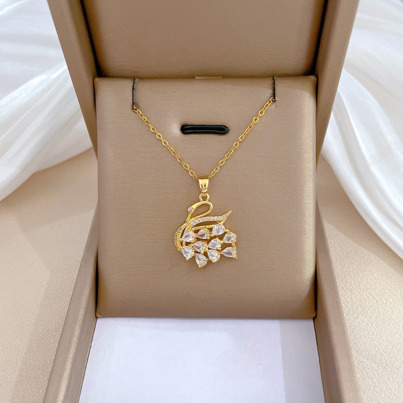 Collana con cigno e cristalli in acciaio titanio per donna_voghion.com