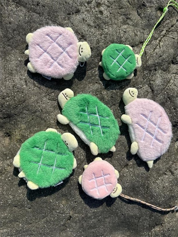 オリジナルのかわいい亀の変な表情シリーズのぬいぐるみの座布団の筆袋の小銭入れの首のイヤホンの包みのプレゼント