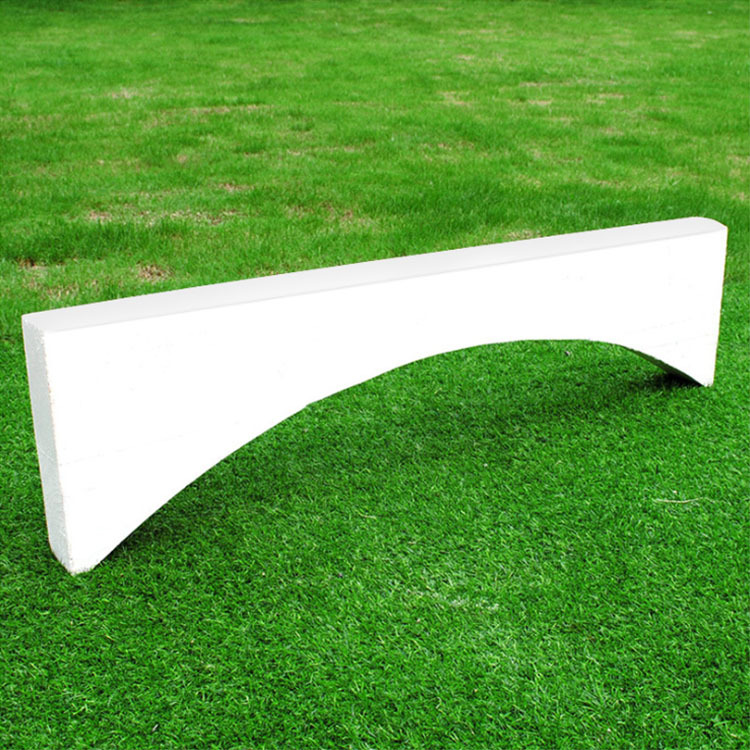 Shot put toe plate, cylindrical, curved, white wooden throwing plate, track and field training and competition auxiliary equipment.