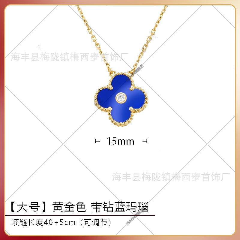 Large four-leaf clover necklace in gold and blue agate with diamonds in the middle