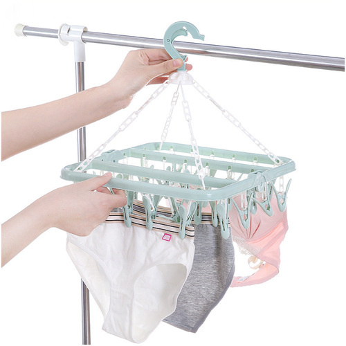 32 clips 0 folding clothes hanger adult windproof clothes drying rack household plastic children's socks clothes drying rack wholesale