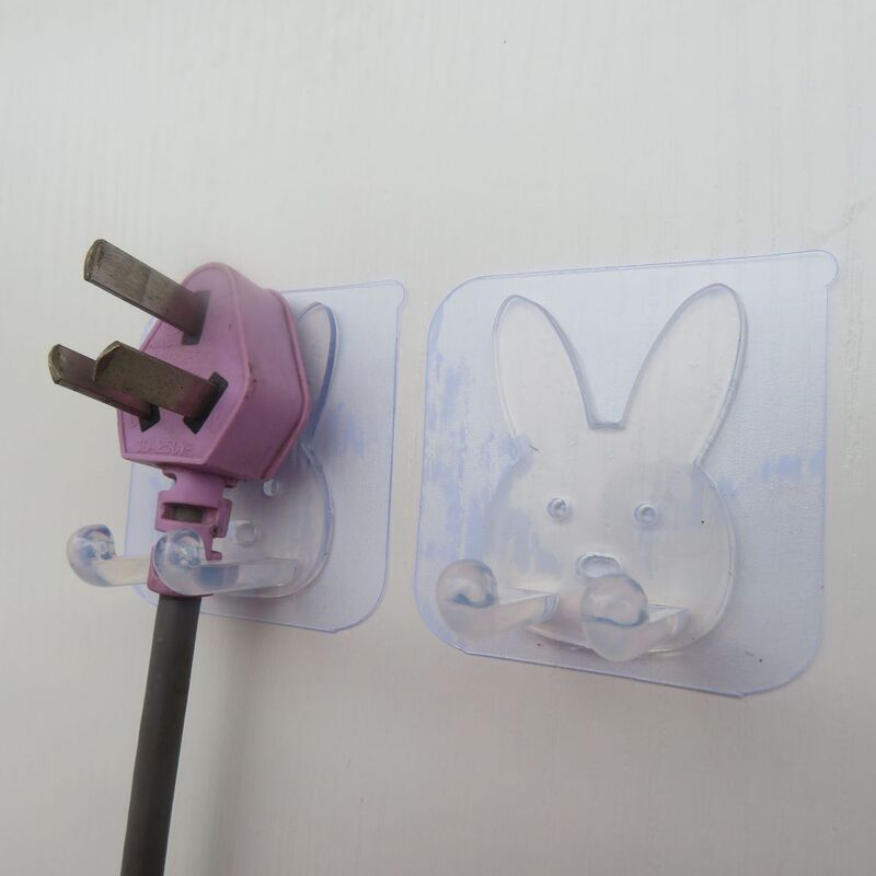 Rabbit plug hook multi-function socket double hook kitchen fixed seamless adhesive door hook non-punching bracket Rabbit plug hook multi-function socket double hook kitchen fixed seamless adhesive door hook non-punching bracket